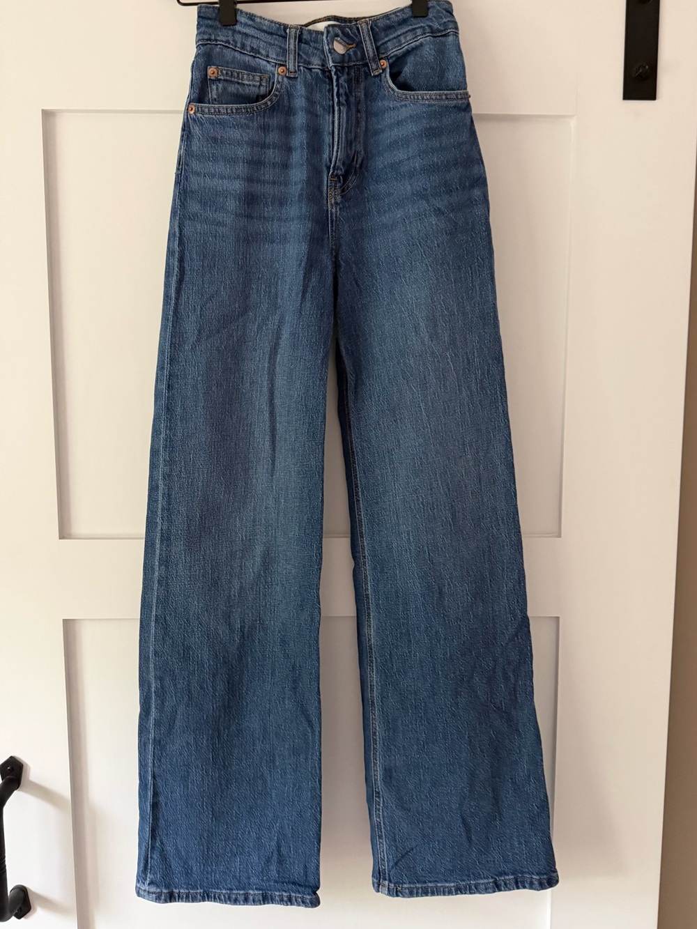 H&M Wide-Leg Flared Jeans in Medium Blue Wash